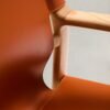Jan chair made of light brown recycled leather fibres and FSC 100% solid ash wood with natural tone finish